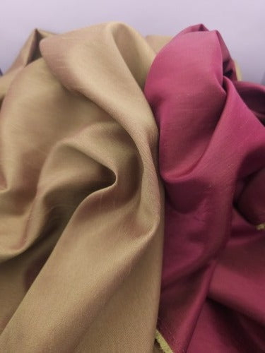 Close-up of Satin & Silk reusable gift wrap showing the textured raw silk side and smooth silk satin reverse