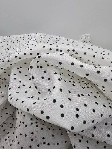 Polka_dot_silky_fabric_wrapping_white_with_black_dots
